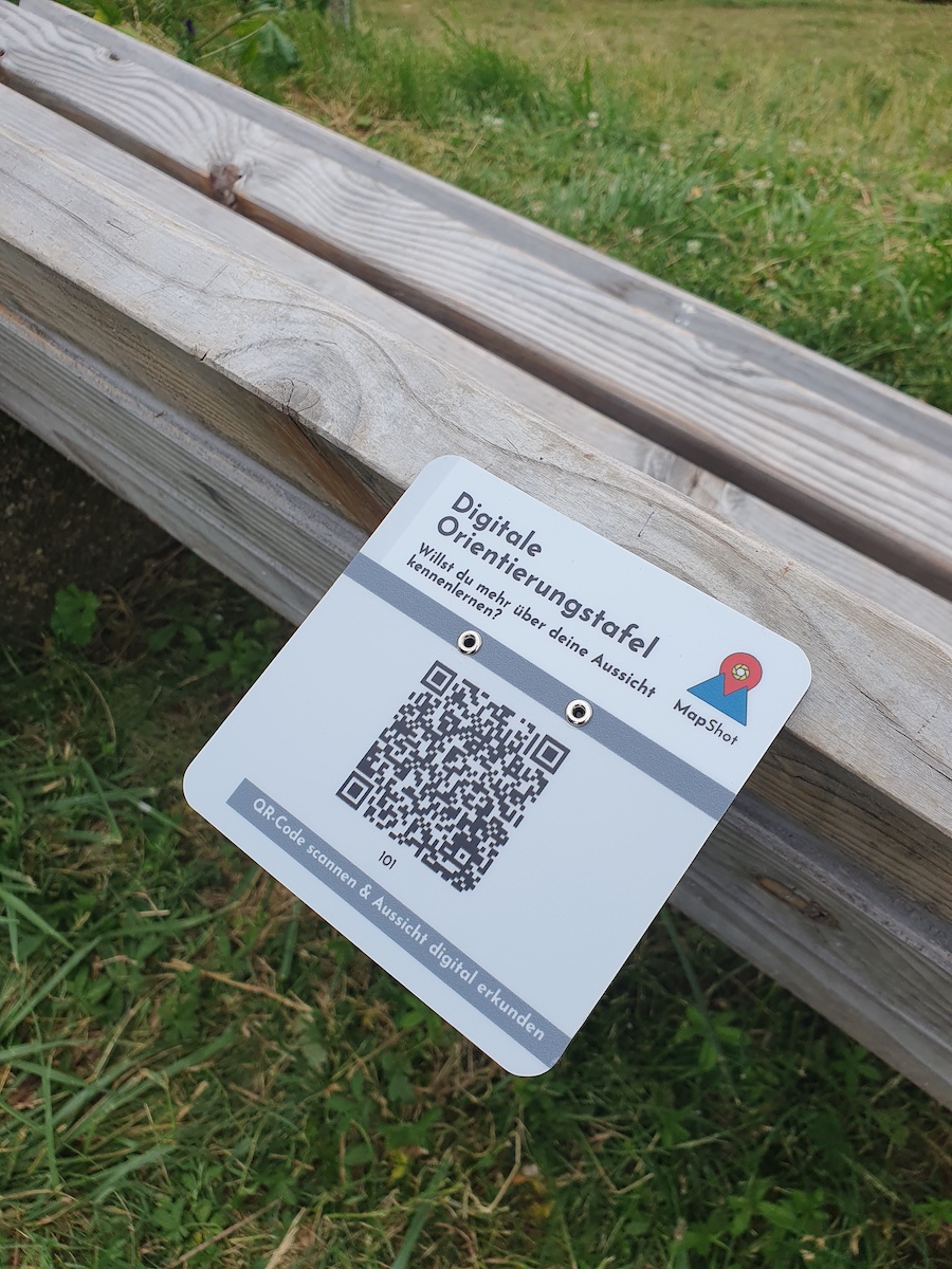 Mountain landscape with QR plaque